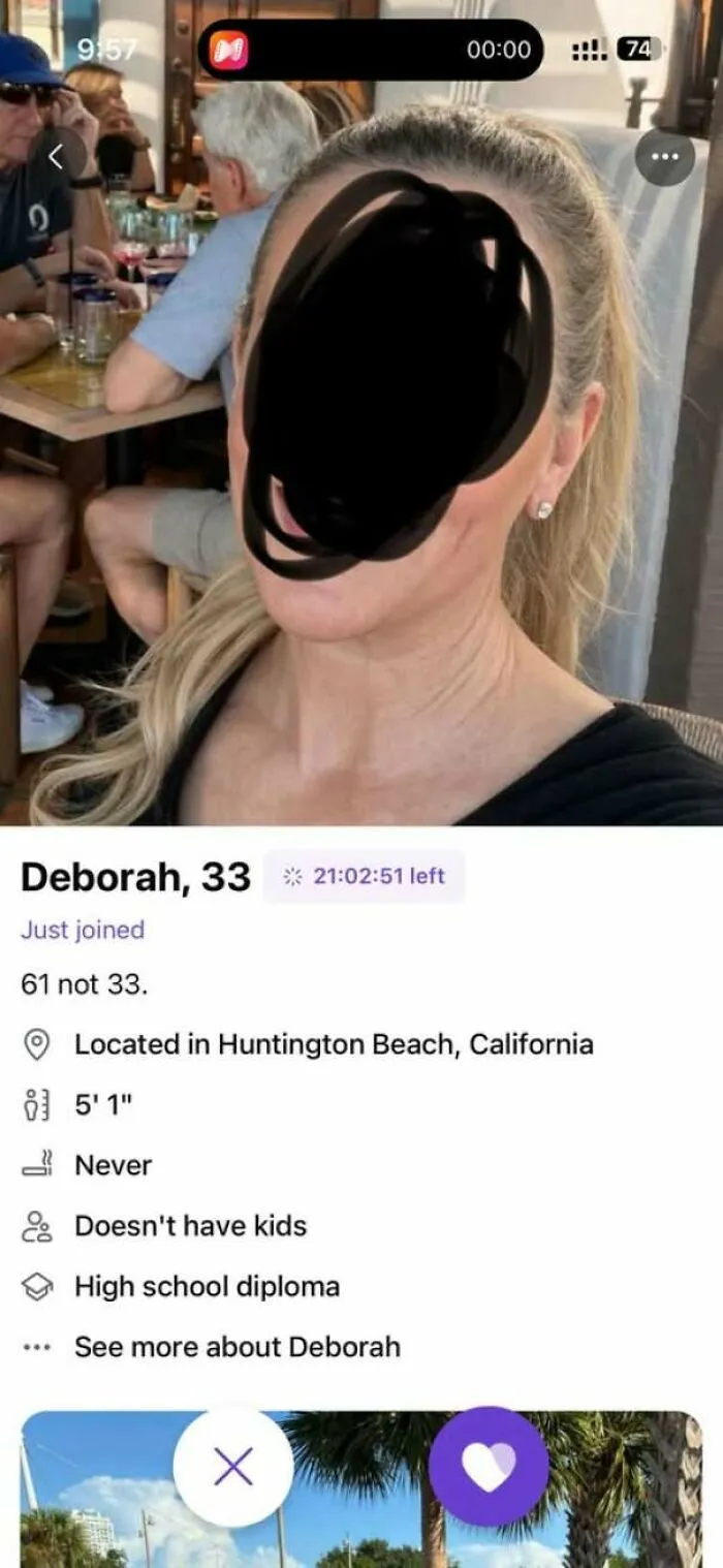 A woman with her face scribbled out on bad dating profiles.