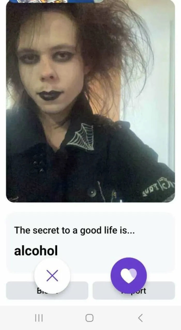 A person with goth style makeup shown in bad dating profiles.