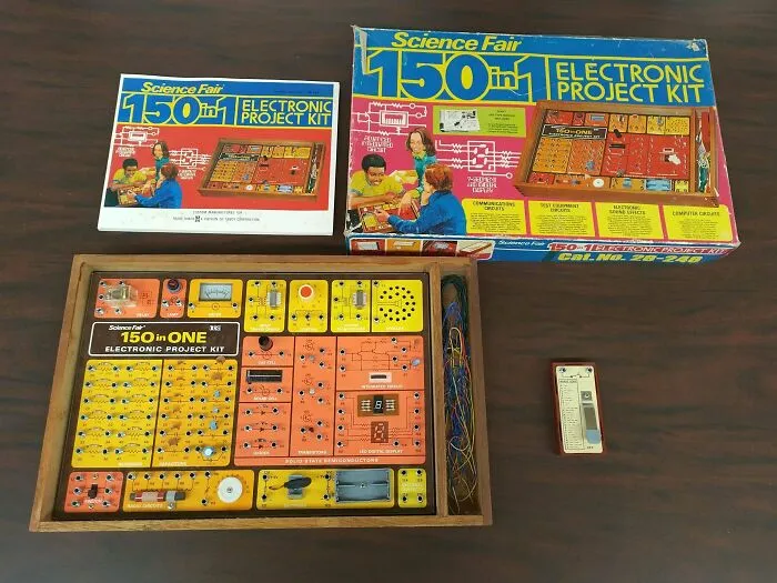 Science Fair 150 in 1 electronic project kit box and board displaying vintage retro gadgets