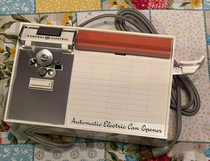 Vintage General Electric automatic electric can opener, a unique example of retro gadgets.
