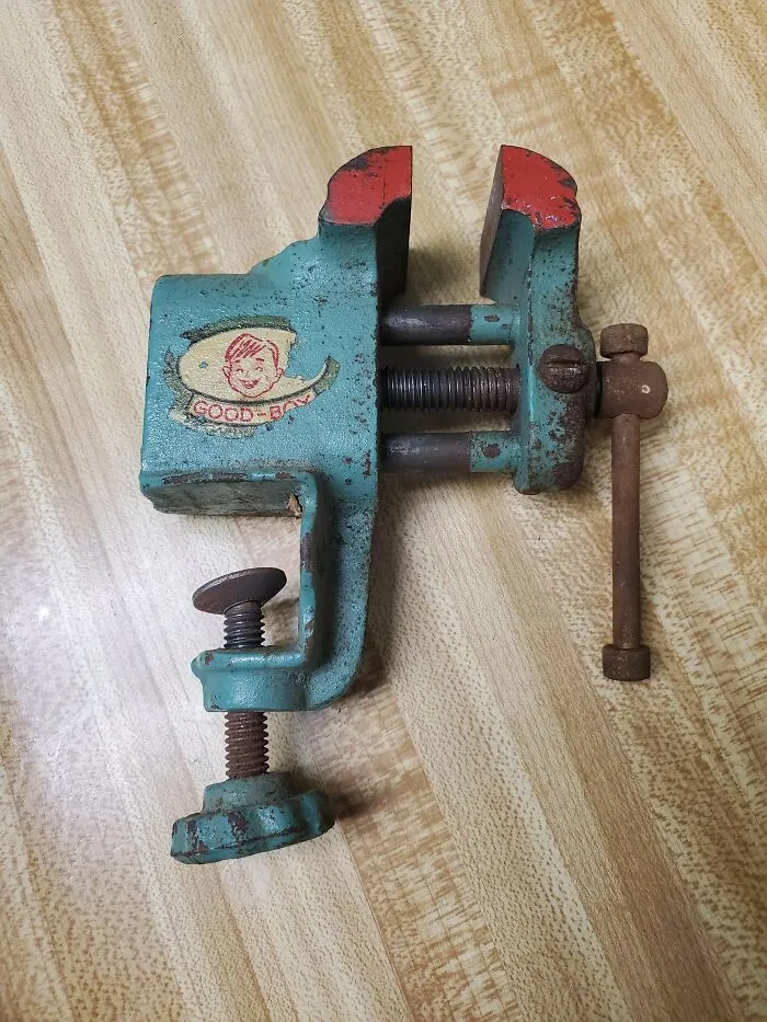 A small turquoise painted Good-Boy brand clamp vise as unique retro gadgets technology