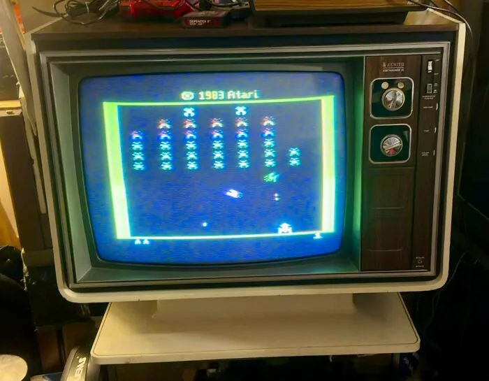 A vintage television set displaying a video game as an example of retro gadgets technology