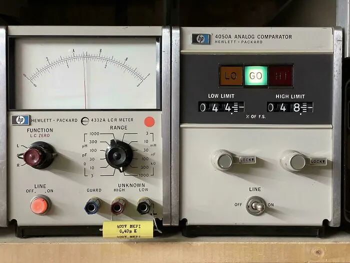 Hewlett Packard analog LCR meter and comparator displaying retro technology equipment.