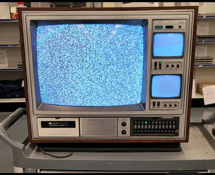 Multi-screen vintage color television showcasing retro gadgets technology.