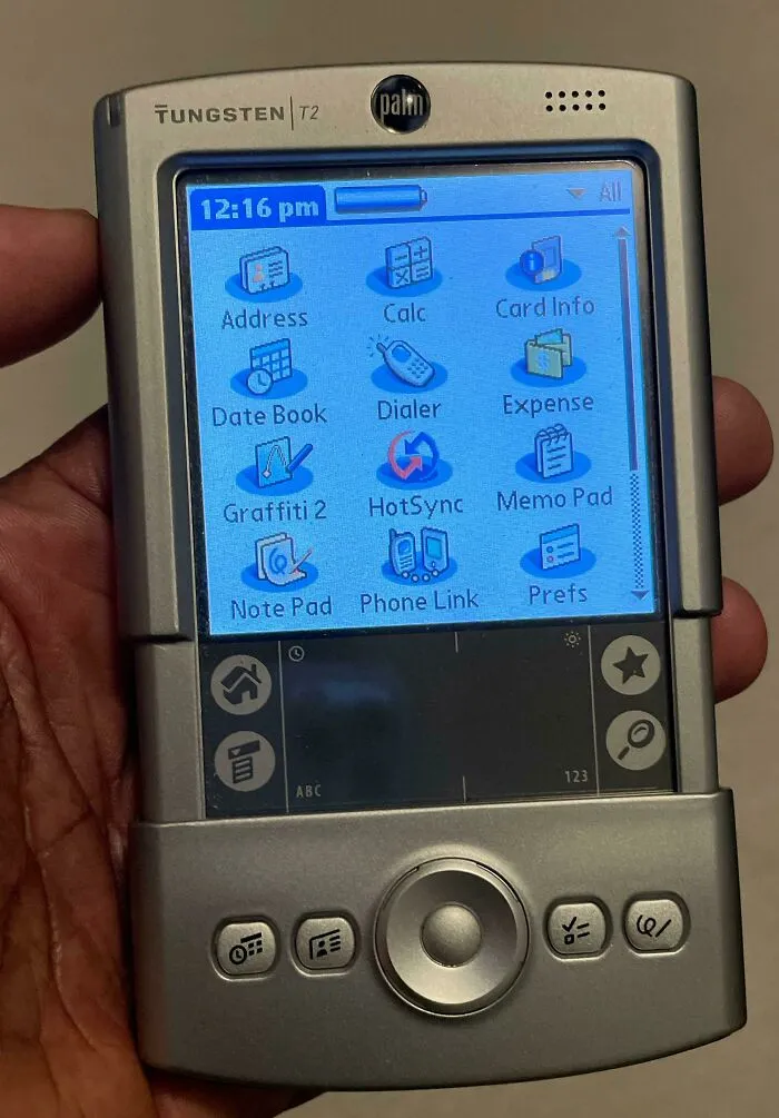 Palm Tungsten T2 handheld PDA showing retro gadgets technology.