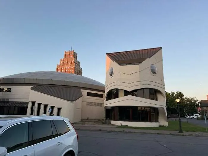 Building windows and shapes mimic surprised face