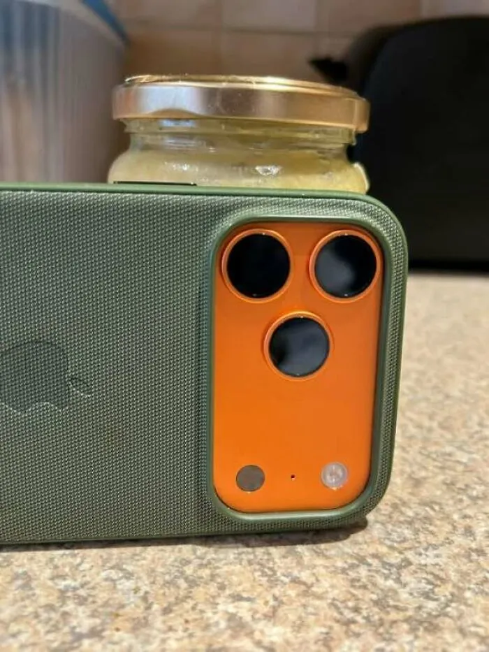Phone camera lenses resembling a surprised face