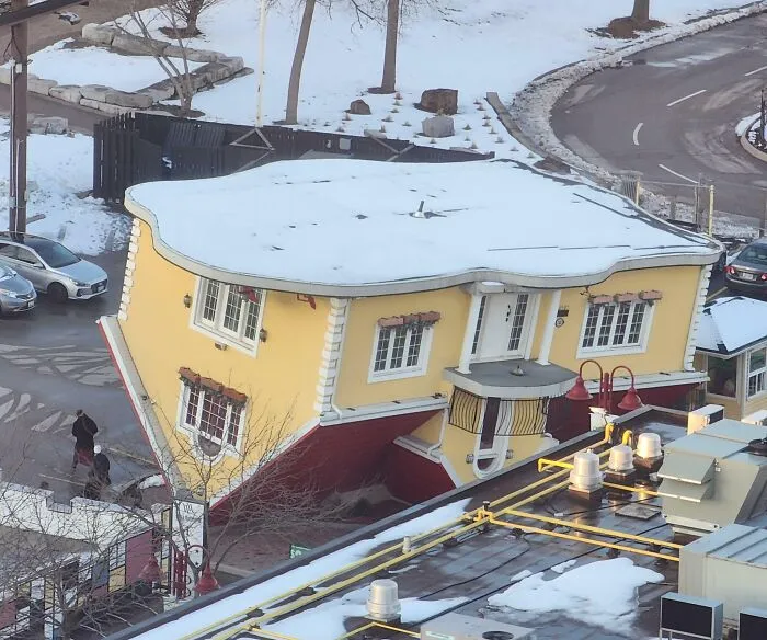 Strange upside down house in winter snow