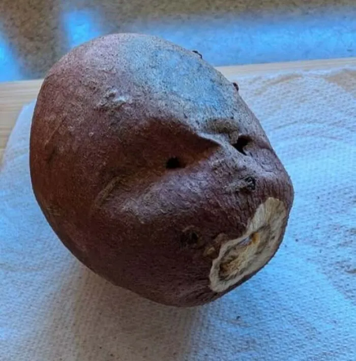 Rotten fruit resembling a frowning face
