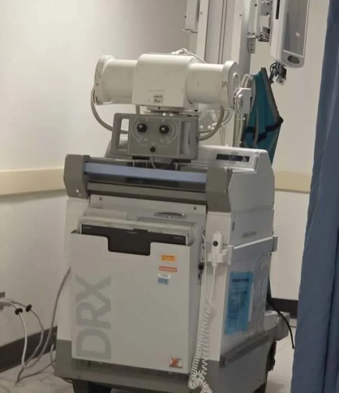 Medical machine with components resembling a face staring
