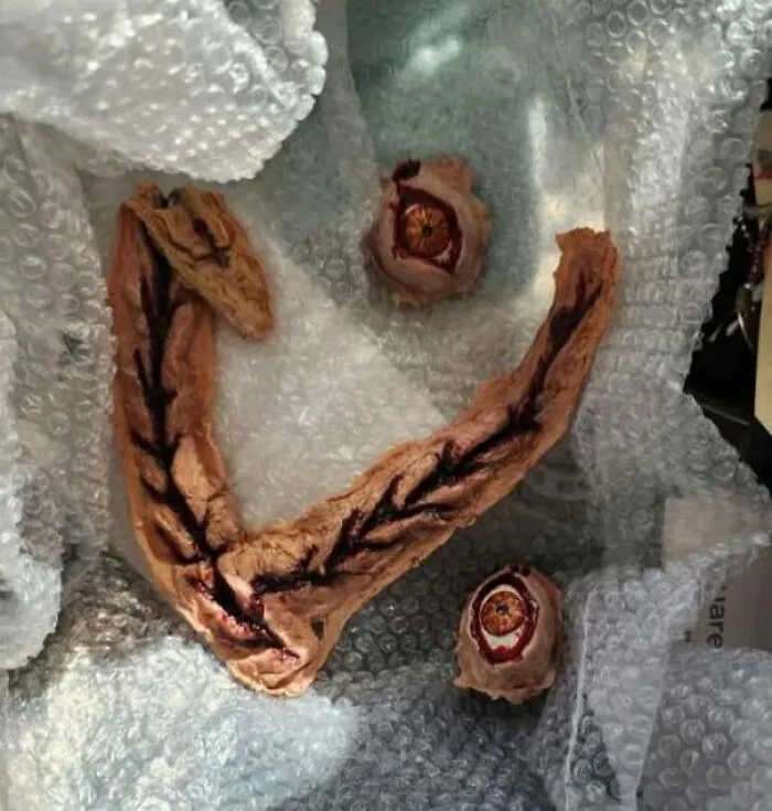 Scary looking crafting pieces resembling staring eyes and a mouth