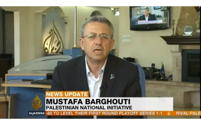 A TV news screen shows a man behind the anchor, like something in the background completely hijacked the moment