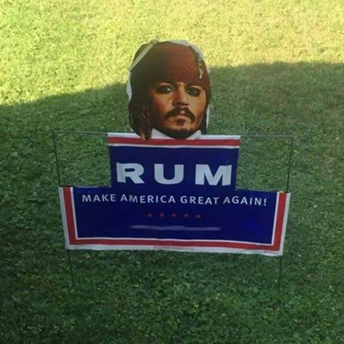 Hilarious act of vandalism replacing a political sign with Captain Jack Sparrow and RUM