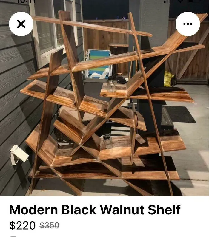 An unstable and oddly angled black walnut shelf listed online as a failed home DIY project.