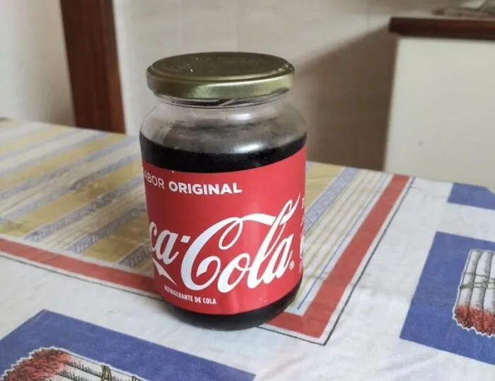 A jar of Coca-Cola with a metal lid, depicting weird roommate stories