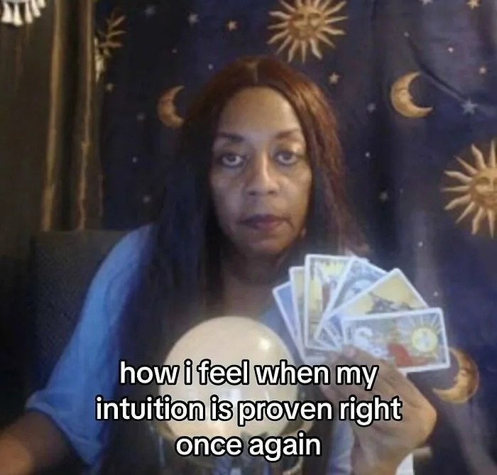 Woman holding tarot cards and crystal ball meme about female intuition proven right