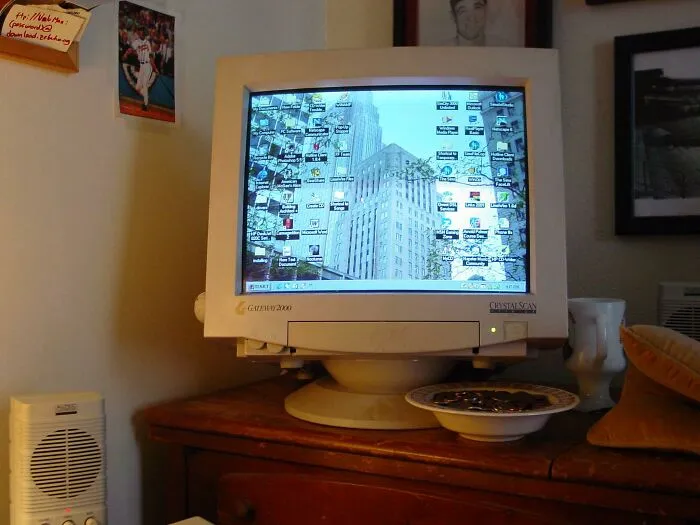 A Gateway 2000 desktop computer setup from 2001 on a wooden desk.