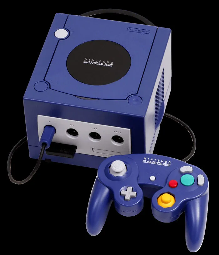Indigo Nintendo GameCube console and matching controller, a popular product release that happened in 2001.