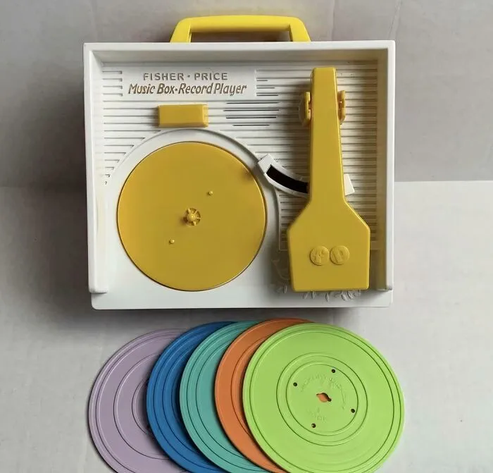 Fisher Price vintage music box record player with colored discs