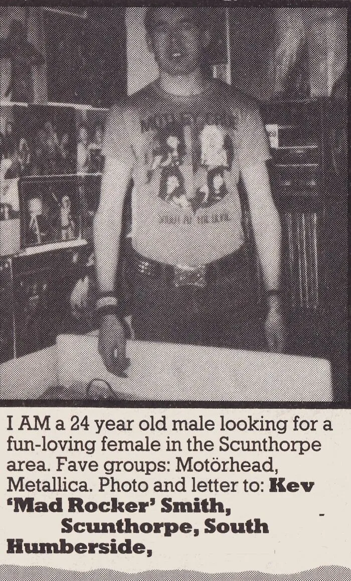 An old personal ad from the past of a young man wearing a band t-shirt looking for love.