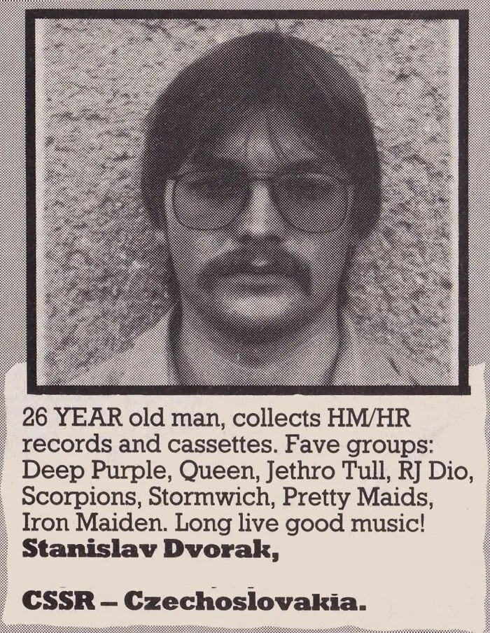 A vintage newspaper personal ad from the past featuring a photo of a man with glasses seeking a music partner.
