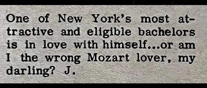 A close up snippet of a classic print personal ad seeking a Mozart lover in New York.