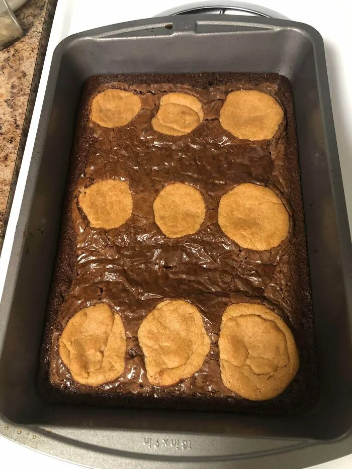 Brownie tray with peanut butter cookies mixed in as a baking fail.