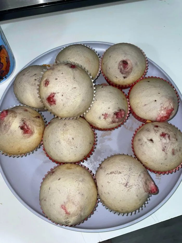 Plate of pale berry muffins showing a baking fail.