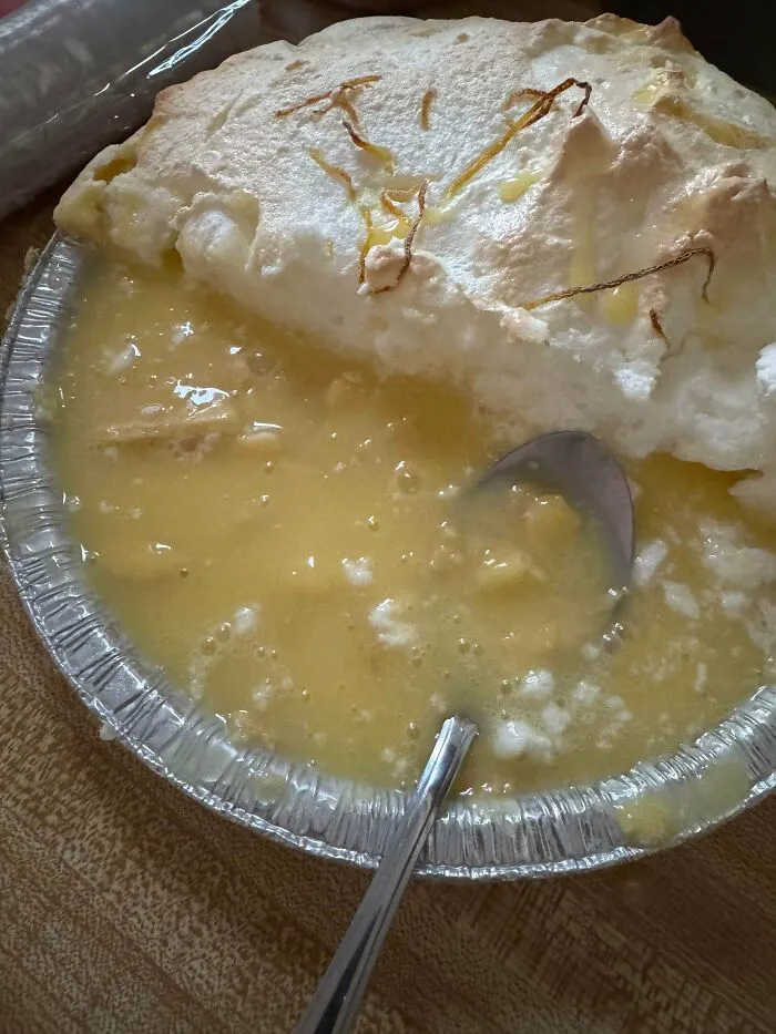 Runny pie filling separate from the meringue top, showing a baking fail