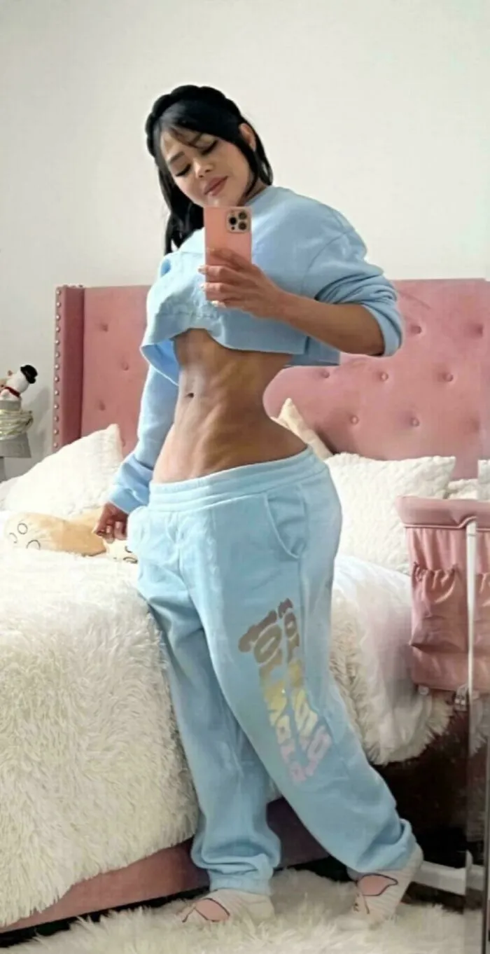 Funny edited photo showing a woman with an exaggeratedly tiny waist