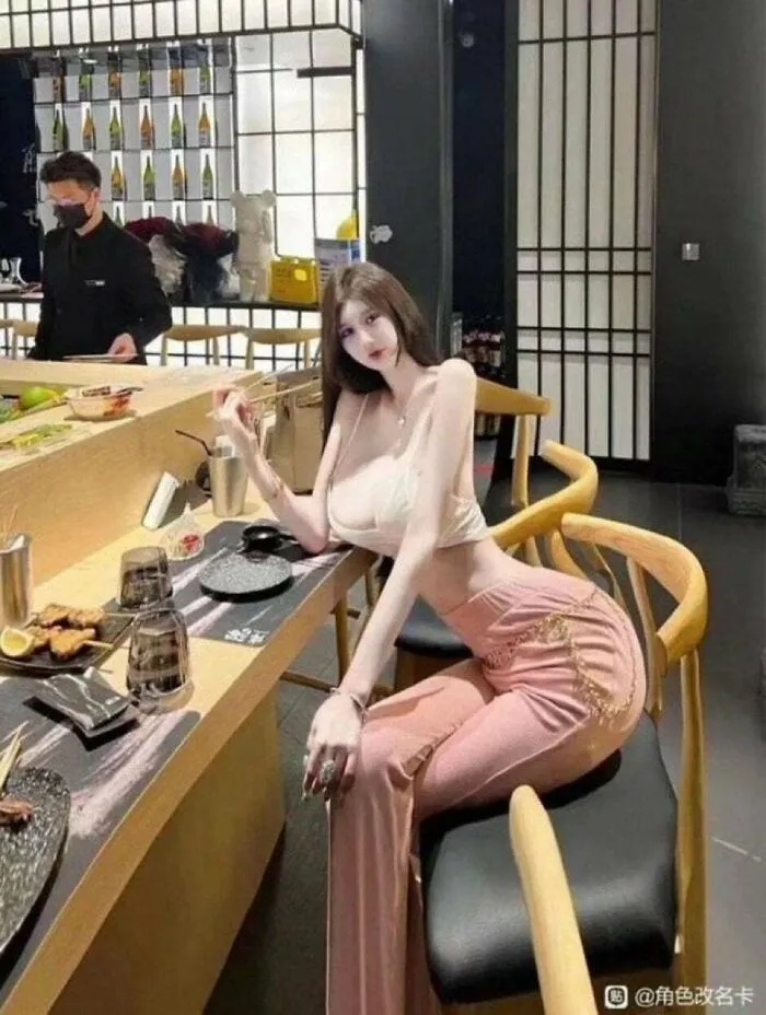 Edited photo of woman with impossibly slim arms and body distortion