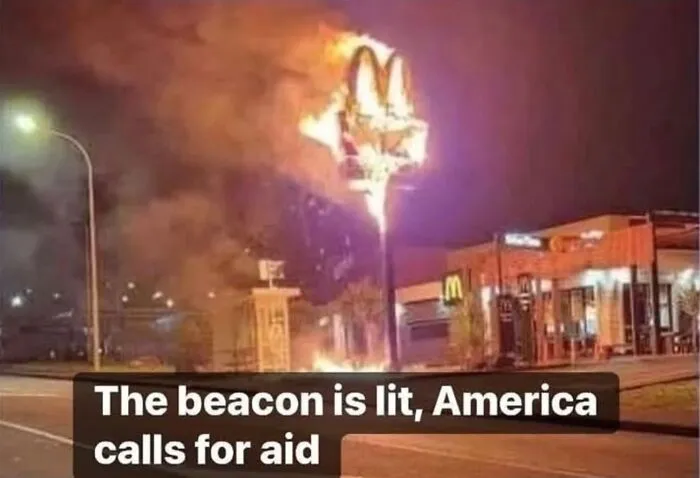 McDonald's sign on fire symbolizing an American call for aid meme