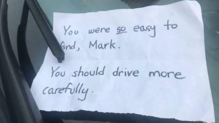 An unsettling handwritten note under a car wiper, one of many creepy cursed images.