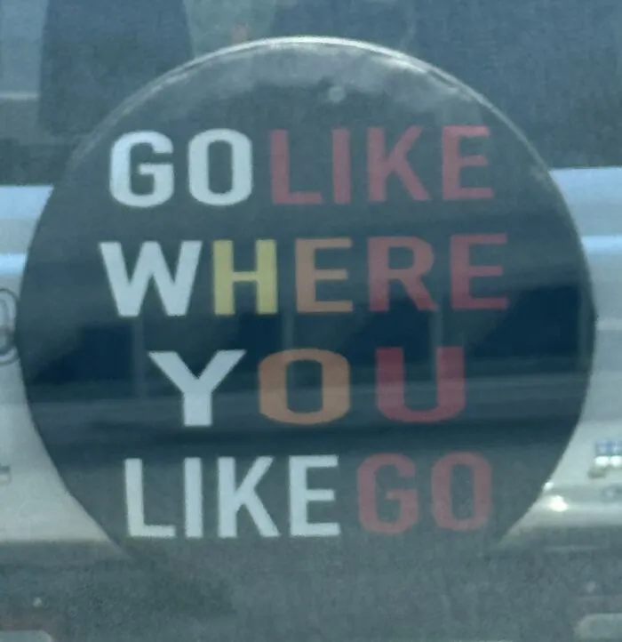 Hilarious badly designed signs on a car spare tire cover with confusingly placed text
