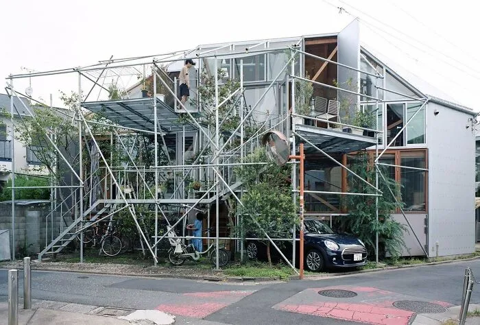 Unique modern house with industrial metal scaffolding structure, an architectural masterpiece