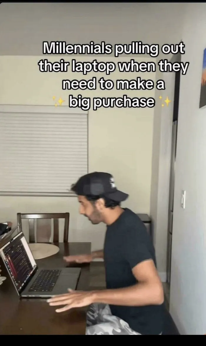 Millennials pulling out their laptop when making a big purchase meme