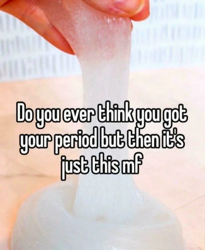 Close-up of hand holding clear menstrual cup with text about period confusion