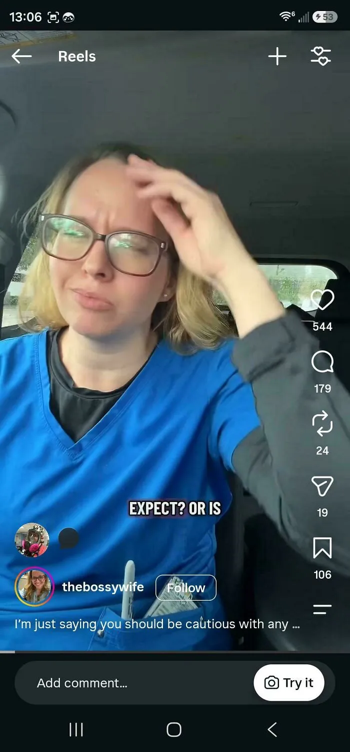 Woman in blue scrubs discussing cautious advice in video