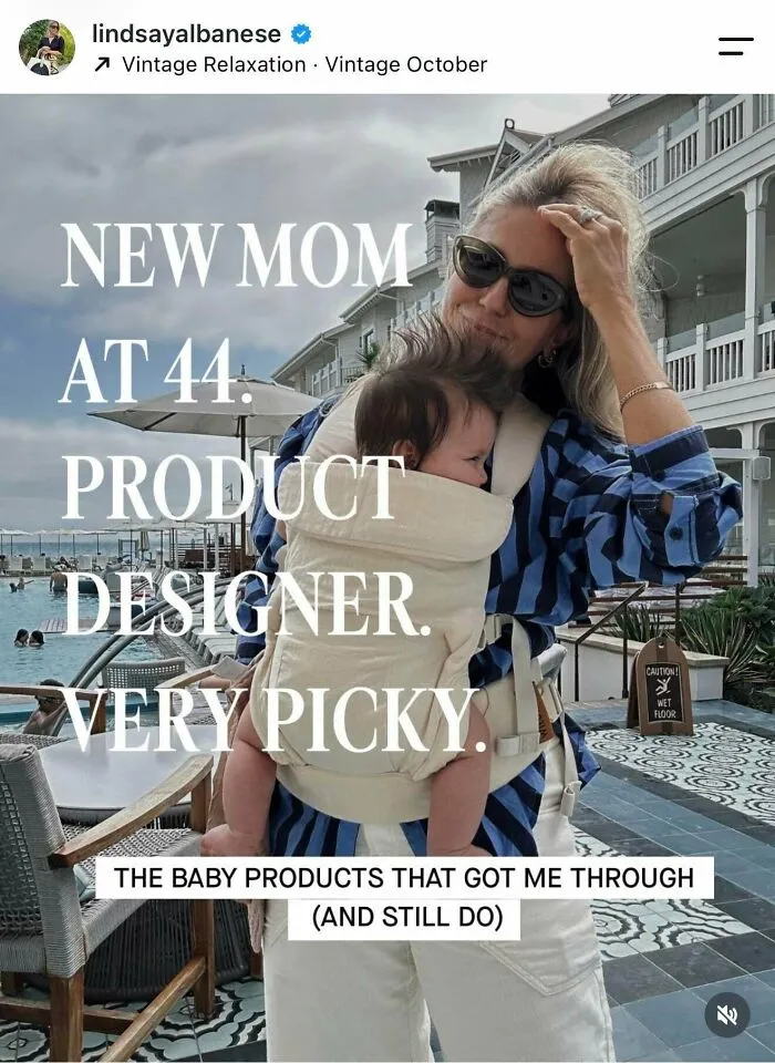 New mom at 44 holding baby in carrier with text about baby products and product designer