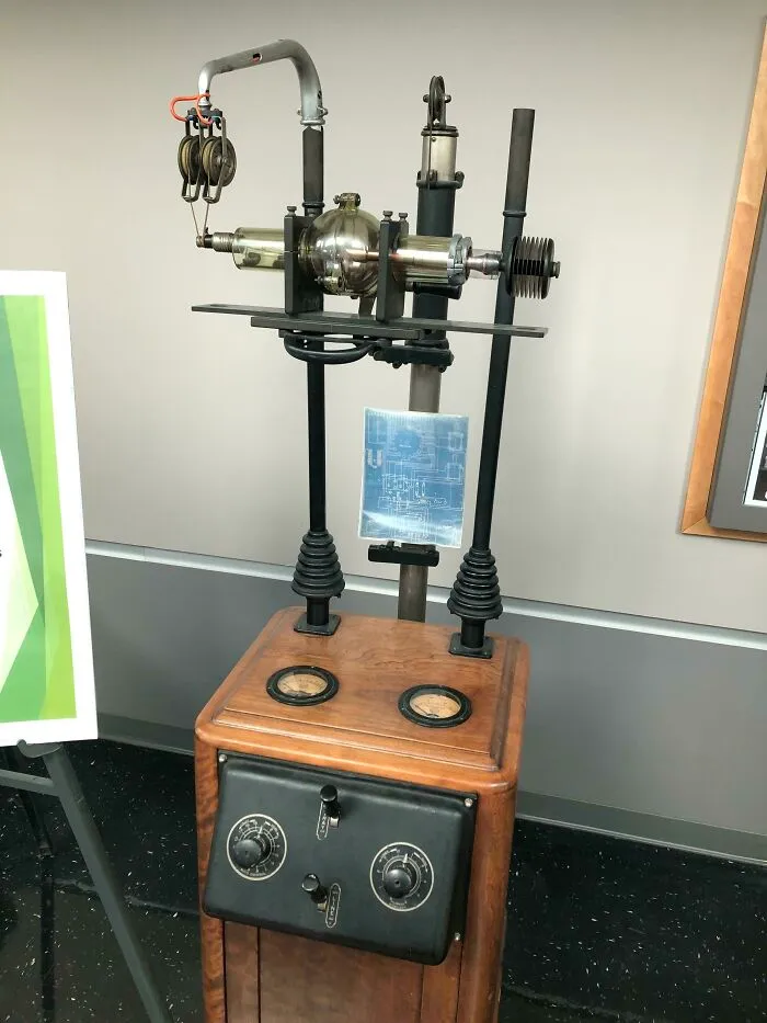 Old scientific apparatus with dials and glass components from historical device