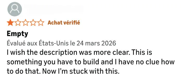 Negative Amazon review complaining about unclear product description and assembly required
