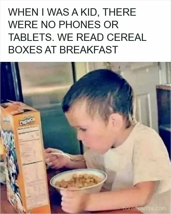 Child eating cereal while reading cereal box as a 90s nostalgic memory