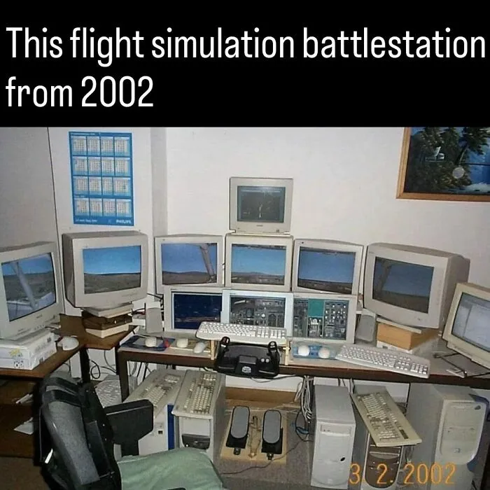 A retro 2002 flight simulation computer battlestation setup with multiple CRT monitors, an intriguing photo from history.