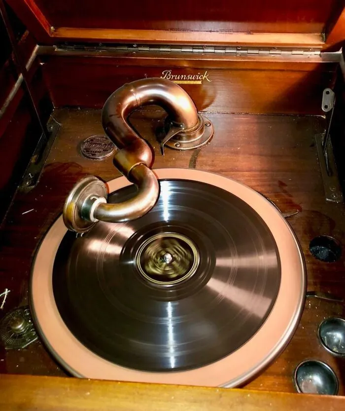 Close-up of antique Brunswick gramophone playing a record