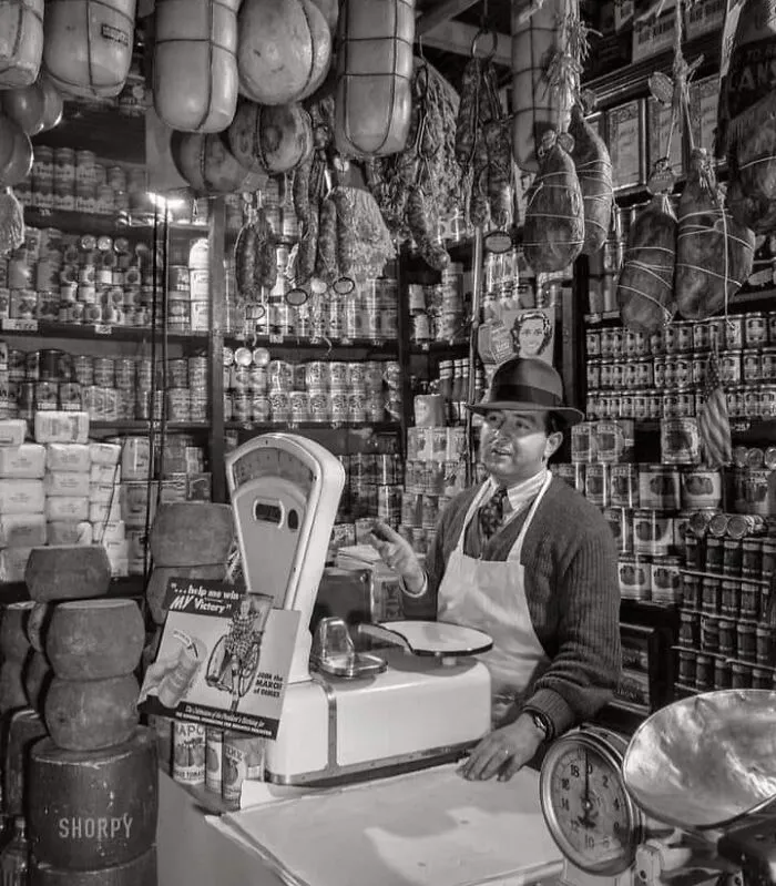 Rare historical photo of butcher shop with hanging meats and vintage scales