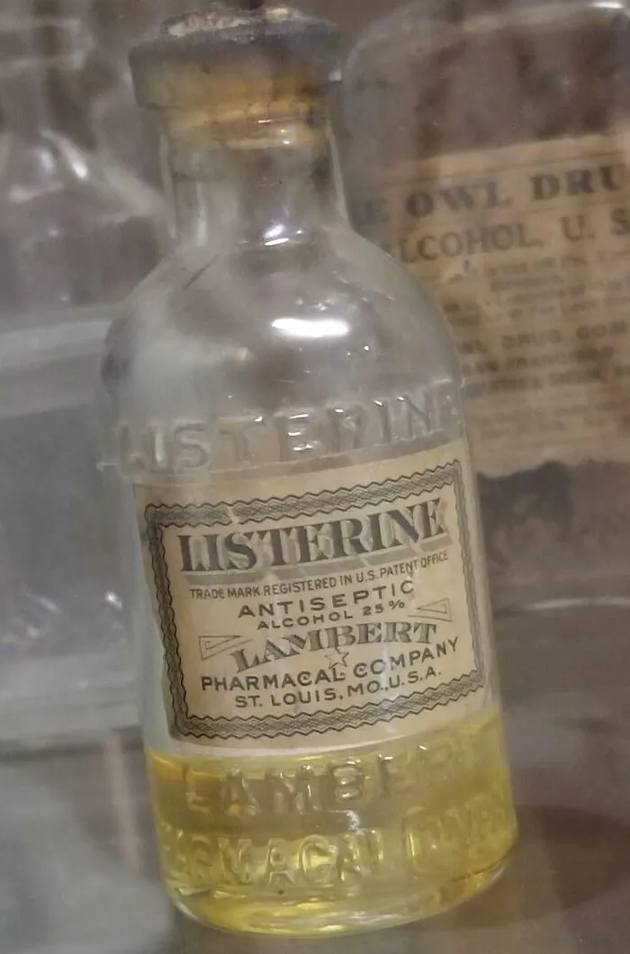 Rare historical photo of an old Listerine antiseptic bottle from Lambert Pharmaceutical