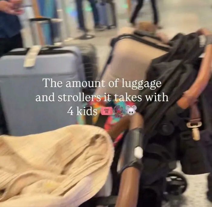 Overloaded luggage and strollers needed for traveling with four kids