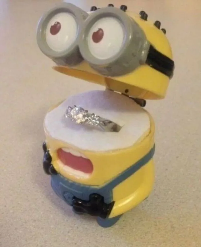 Diamond engagement ring displayed inside a Minion ring box, one of many weird and funny random photos.