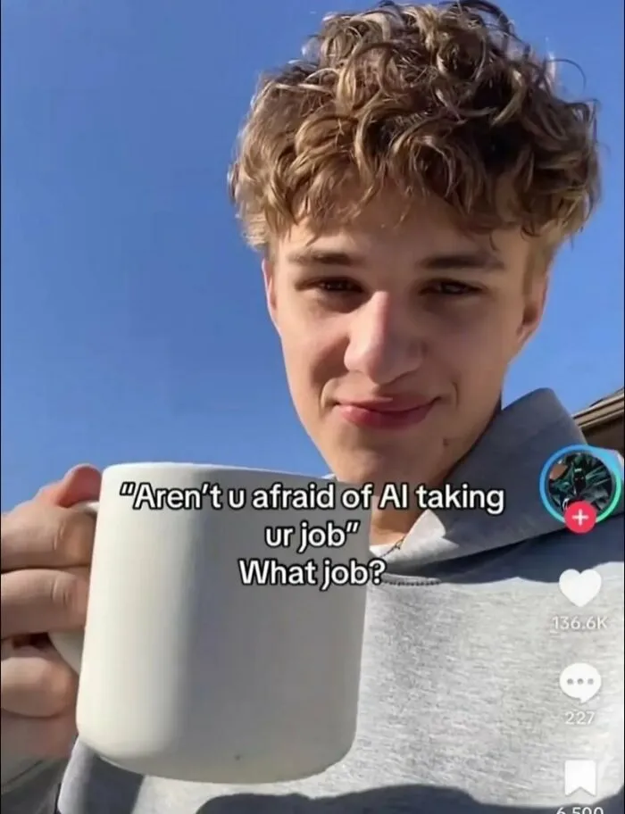 A young man holding a mug in a funny selfie about job loss to AI.