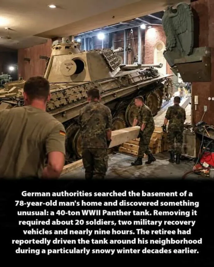 German soldiers moving a WWII Panther tank out of a basement, an interesting history moment.